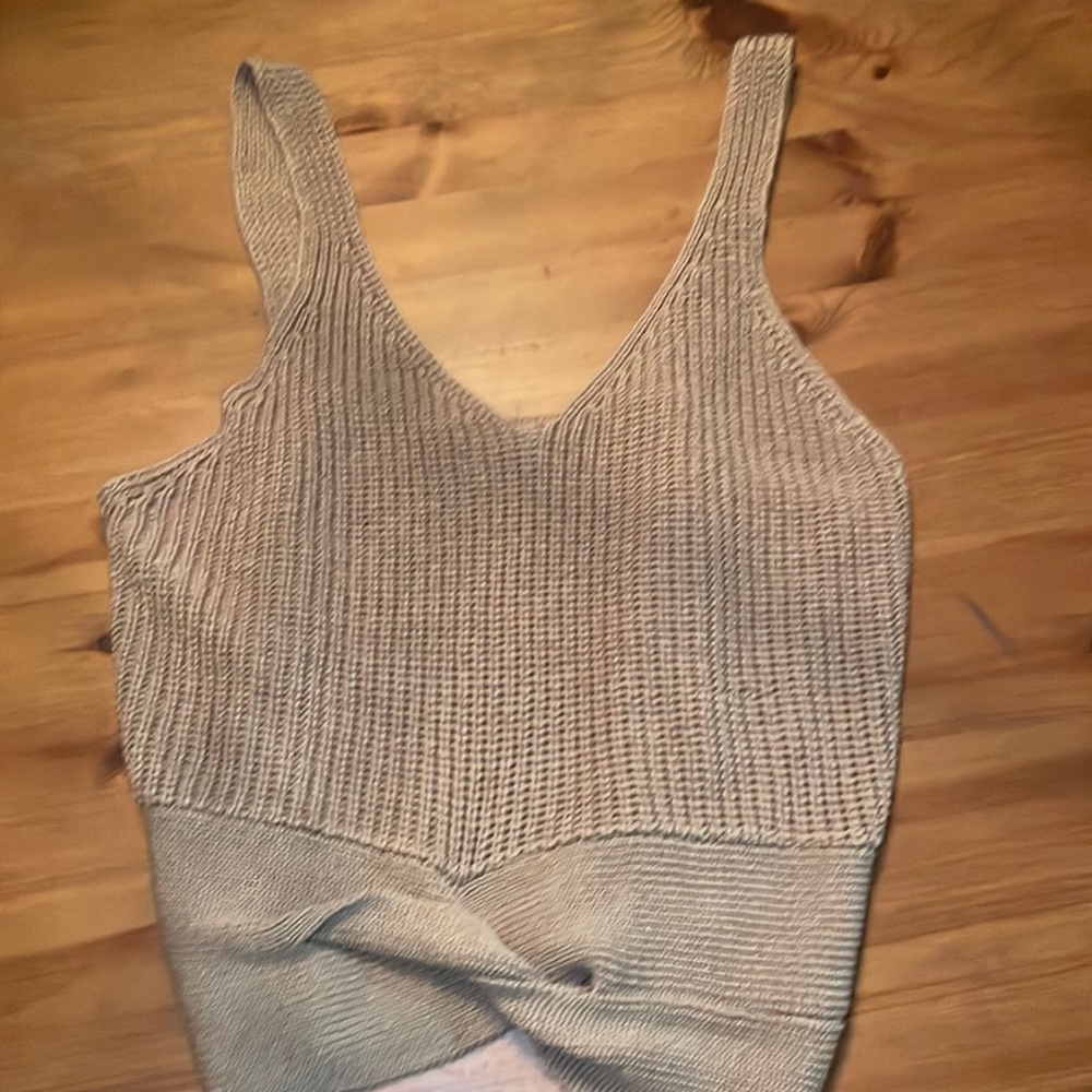 cute knitted top cross at bottom